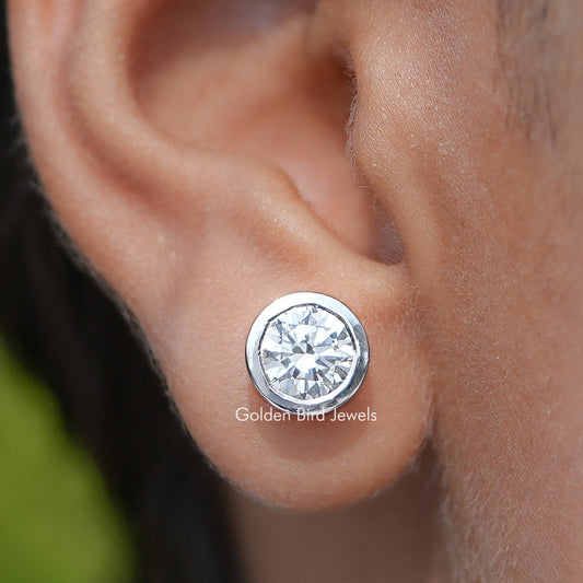 Close Up View Of Lab Diamond Round Cut Bezel Set Stud Earrings