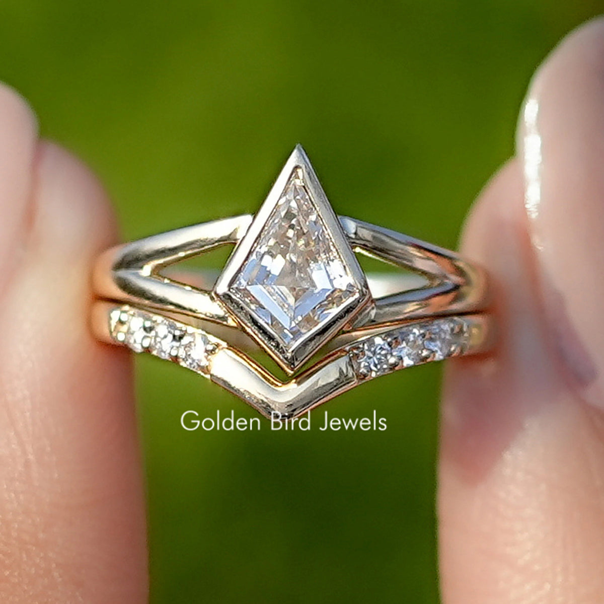 Kite Cut Lab Diamond Bridal Ring Set Held Between Fingers