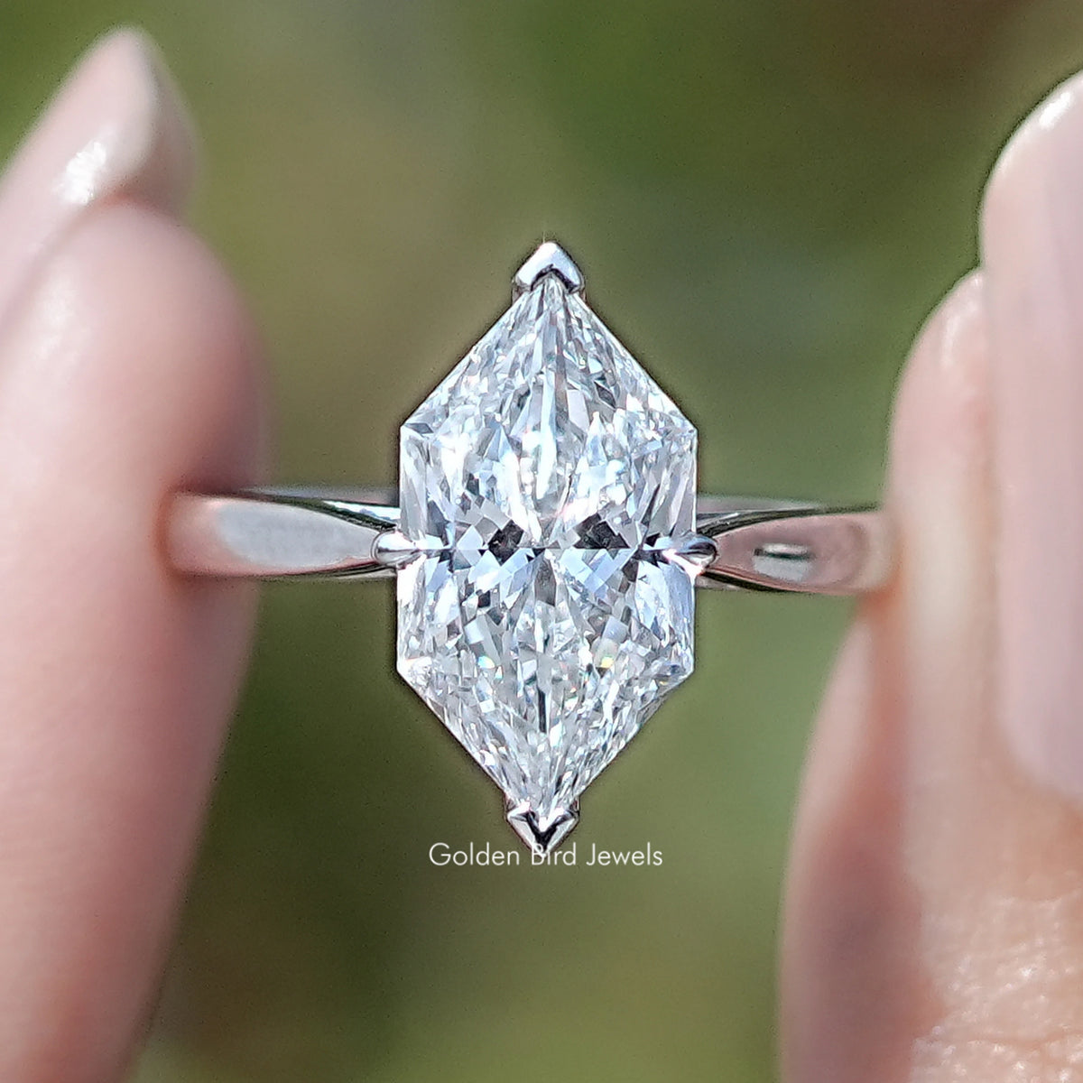 Dutch Marquise Cut Lab Diamond Solitaire Ring in held Finger