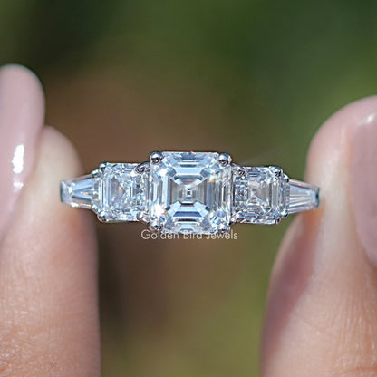14K white gold five-stone ring with Asscher center and baguette side stones