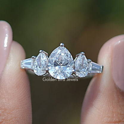 14K white gold five-stone pear-cut diamond ring with sparkling central pear