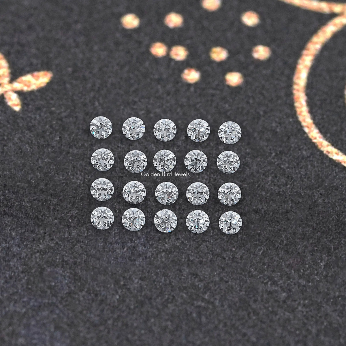 Grid of round lab-grown diamonds, multiple stones on dark display