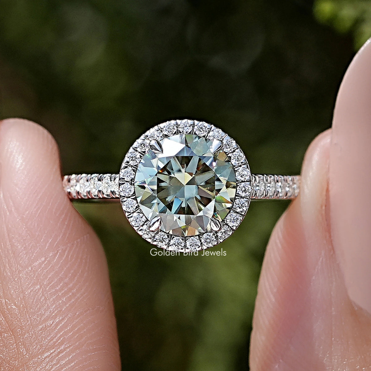 Round-cut moissanite accent ring in silver with pavé halo and slim band