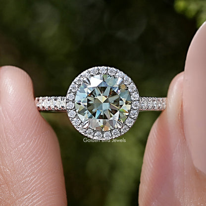 Round-cut moissanite accent ring in silver with pavé halo and slim band
