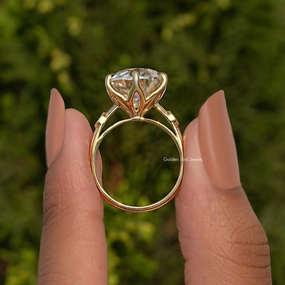 Round moissanite engagement ring with halo setting and rose-gold tone band