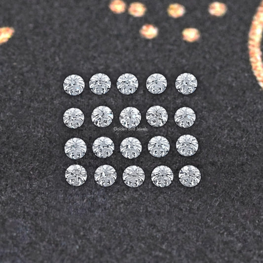 Twenty round lab-grown diamonds arranged in a 4x5 grid