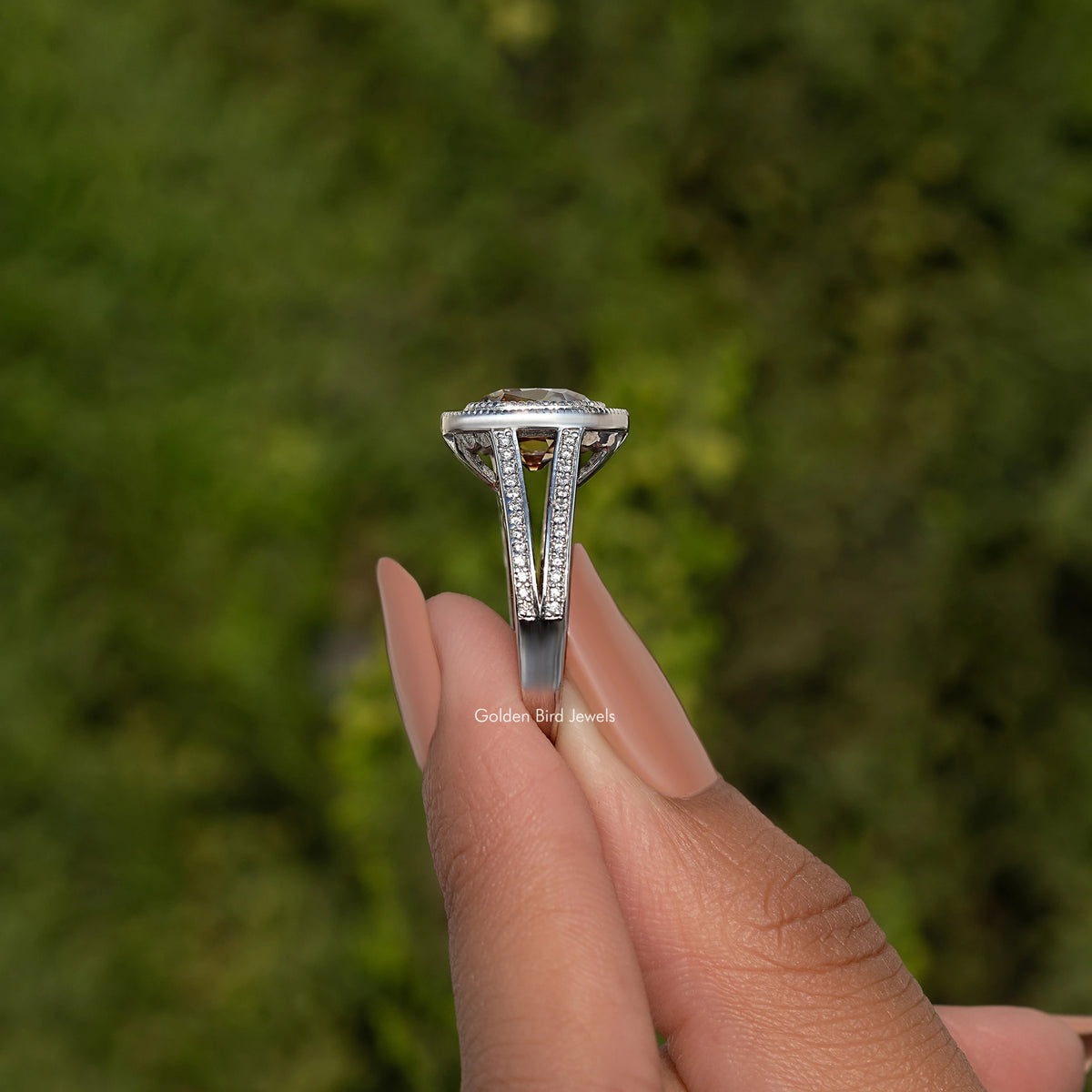 Cushion-cut halo moissanite ring in sterling silver, vertical prong setting