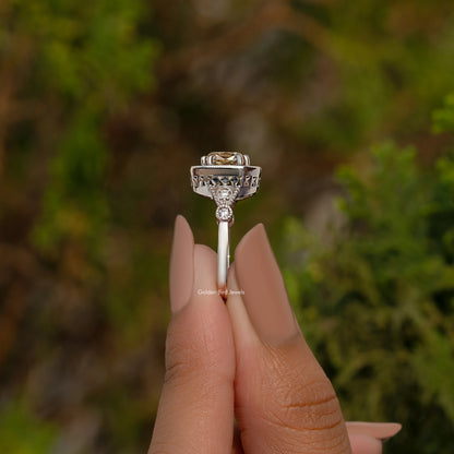 Sterling silver ring top view showing halo with cushion center stone and split shank