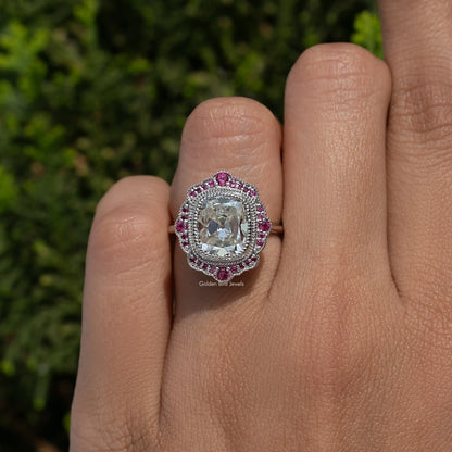 Sterling silver cushion-cut moissanite halo ring with pink gemstone border