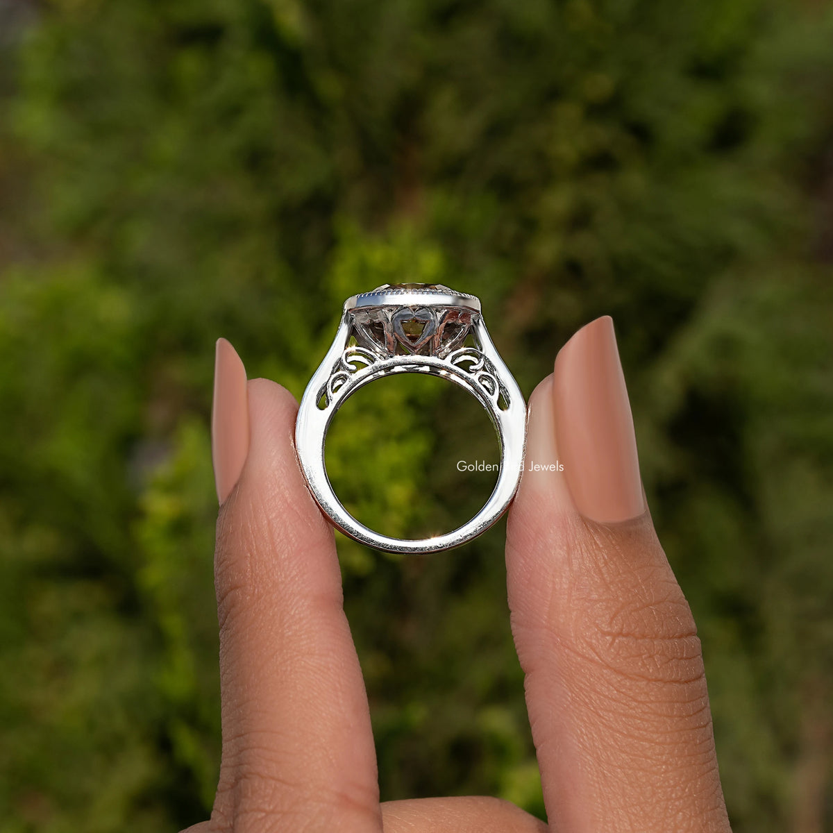 Sterling silver halo ring with cushion-cut moissanite center and split prongs