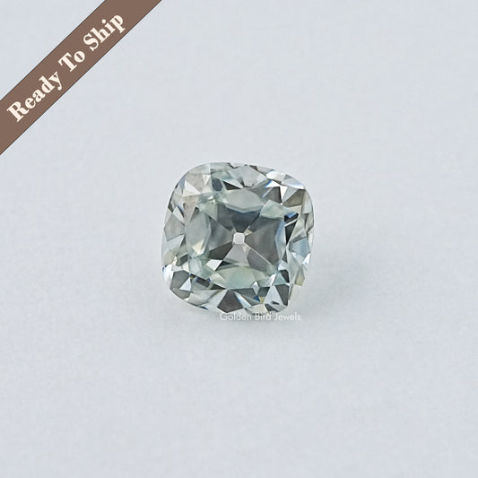 Loose cushion-cut light blue gemstone with faceted rectangular shape