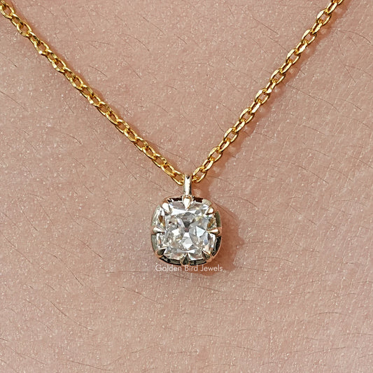 Gold tone pendant necklace with round cushion-cut moissanite in prong setting