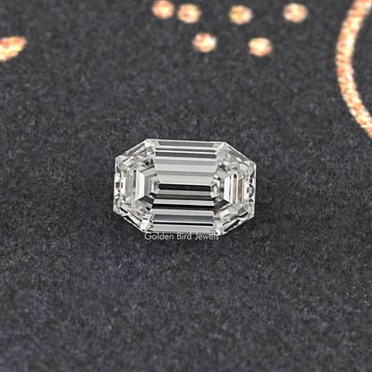 Emerald-cut lab-grown diamond with prominent step facets, face-up