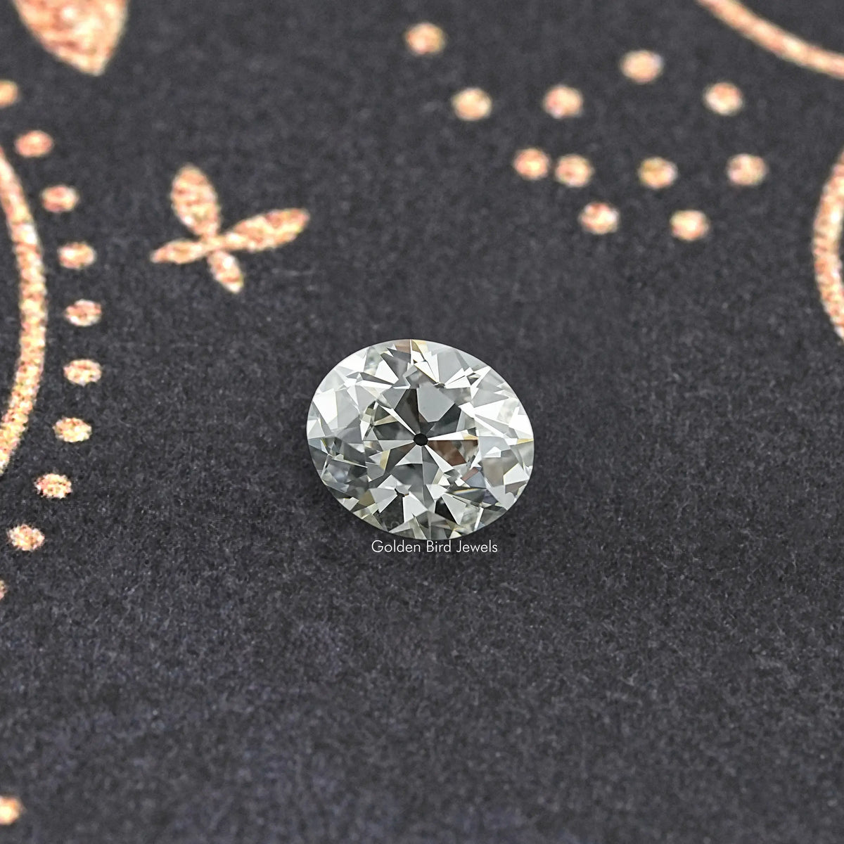 Oval-cut lab-grown diamond, old mine style, top view on dark surface