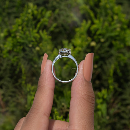 Silver oval moissanite solitaire ring, full view of band and prong setting