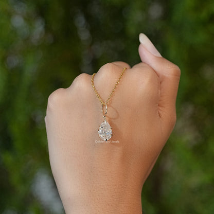 Pear-cut moissanite solitaire pendant on gold-tone chain, teardrop stone