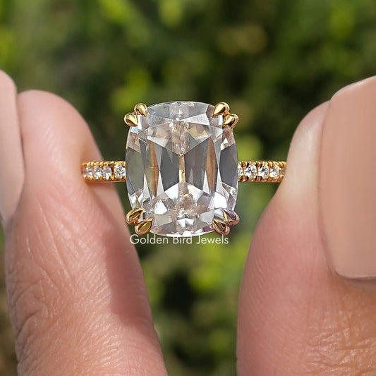 Moissanite ring with cushion-cut center stone and pavé band