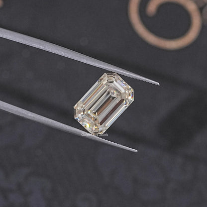In Tweezer View Of Old Mine Emerald Cut Loose Moissanite Stone
