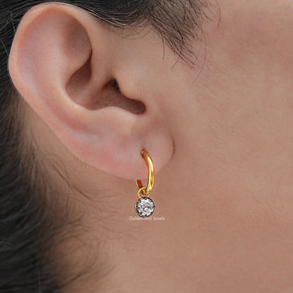 Gold-tone hoop dangle earring with round moissanite stone