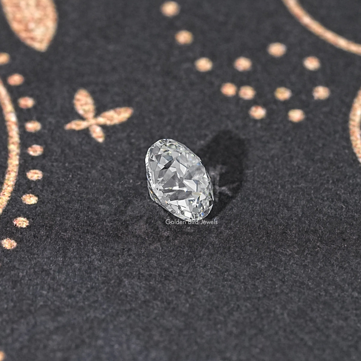 Round old European cut lab grown diamond viewed at an angle, prismatic facets
