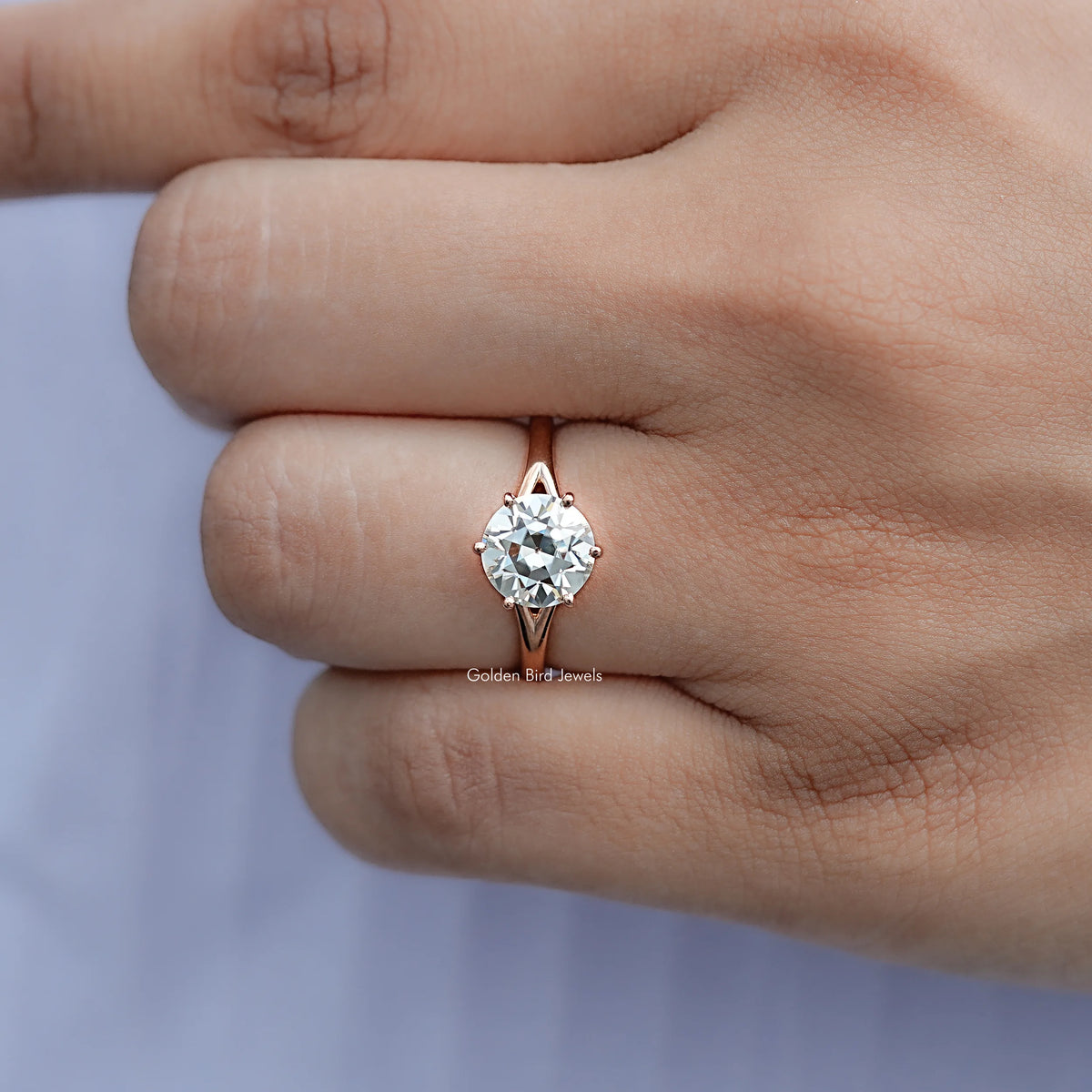 View of Round Cut Moissanite Engagement Ring in prongs setting