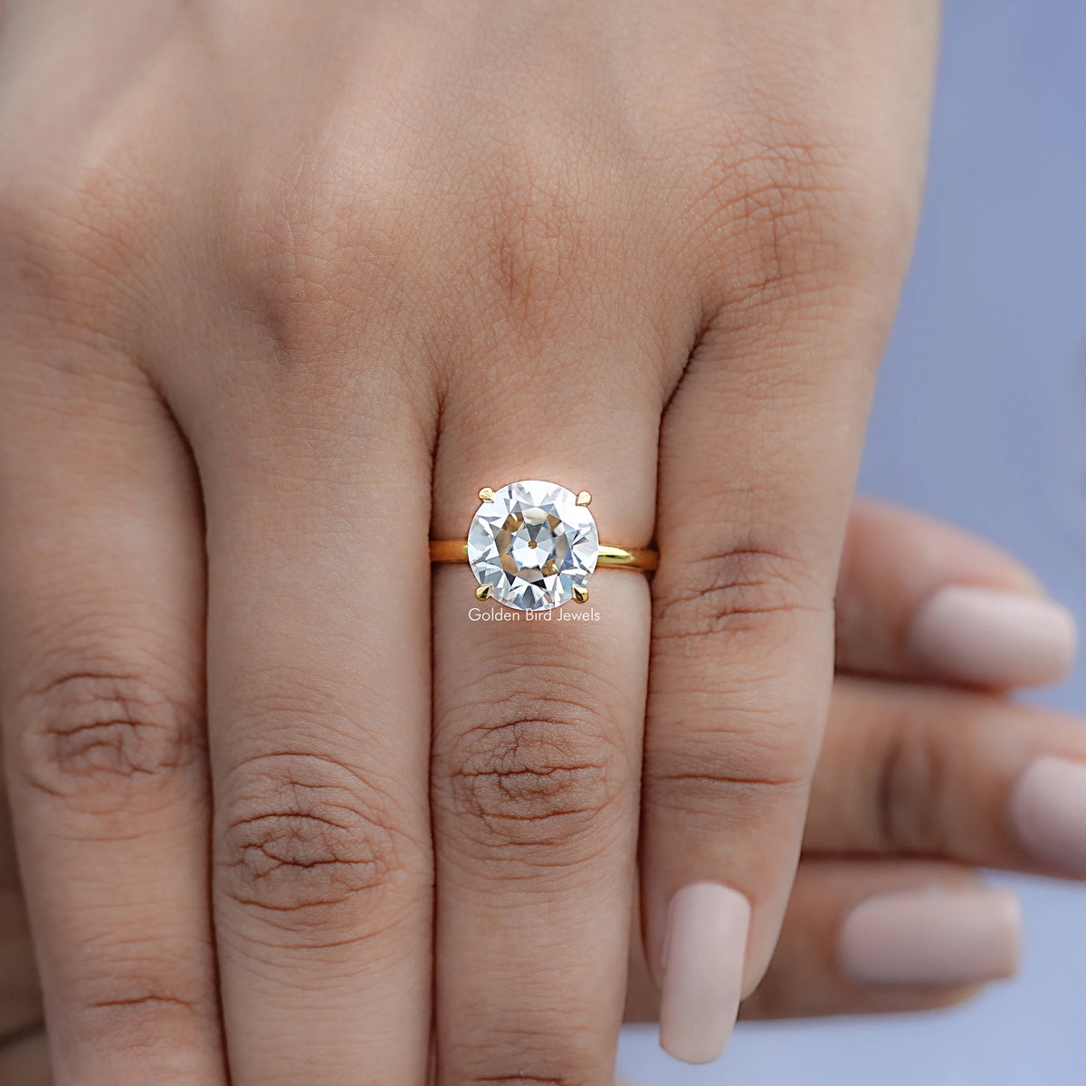 View of Round Cut Solitaire Engagement Ring in prongs setting