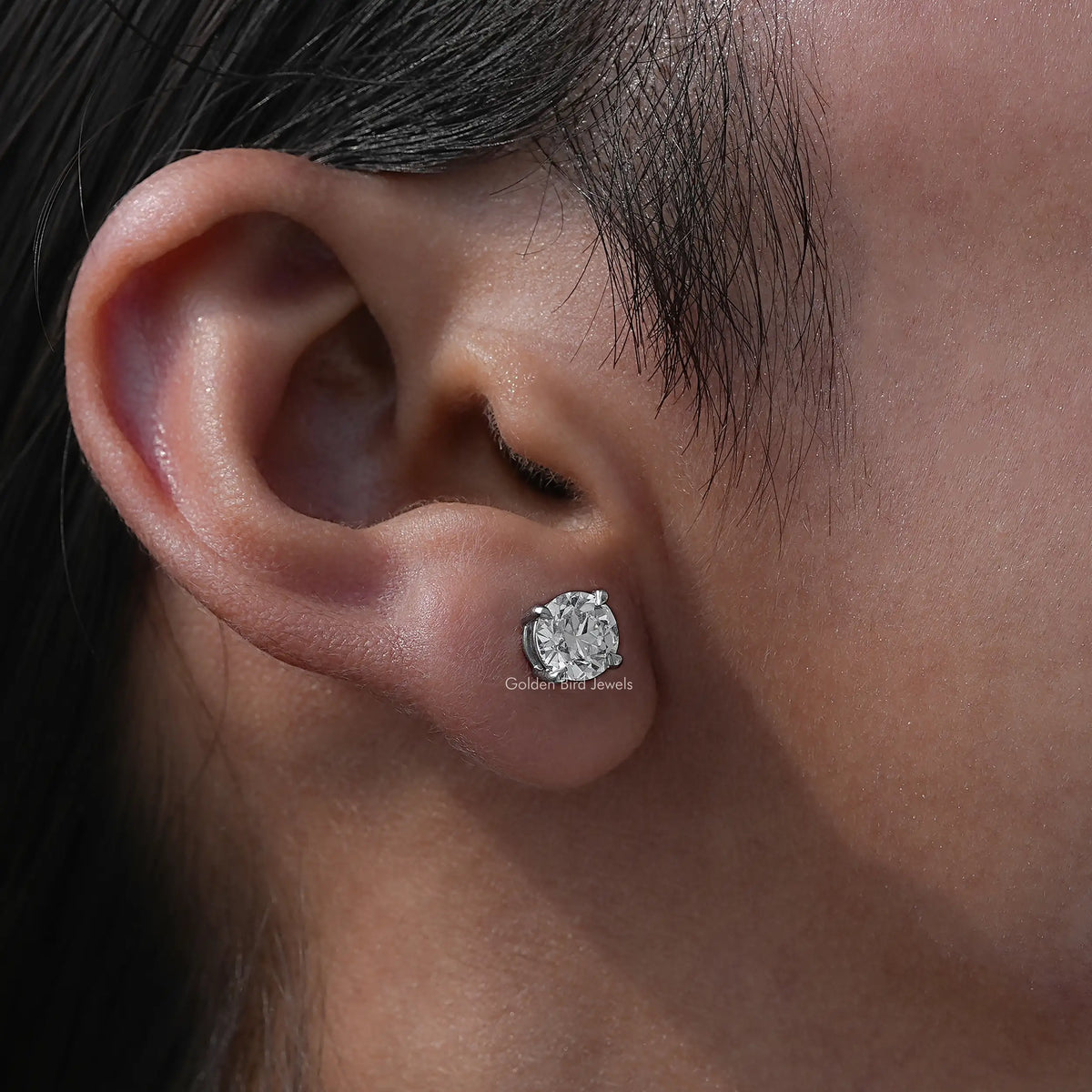 Side View Of Four Prong Set Round Cut Diamond Stud Earrings