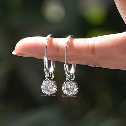 Pair of 925 sterling silver hoop dangle earrings with round moissanite drops, finger hold
