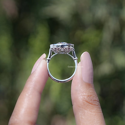 Round moissanite halo ring showing openwork gallery and split band