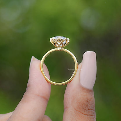 Back view of Round Cut Solitaire Engagement Ring in secure setting
