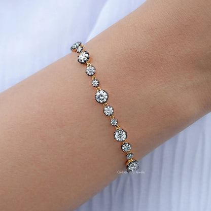 Round-stone bracelet with silver setting, close-up on wrist