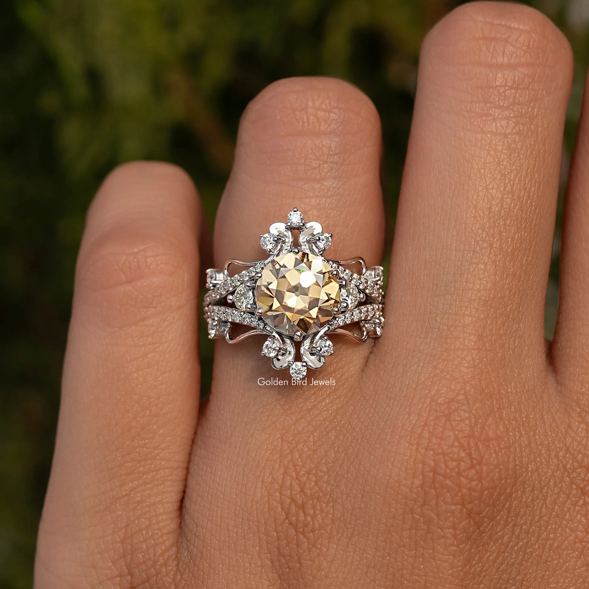 Round cut moissanite ring in 925 sterling silver, front view on finger
