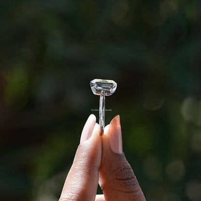 Asscher-cut moissanite bezel set ring, close-up of square stone and bezel setting