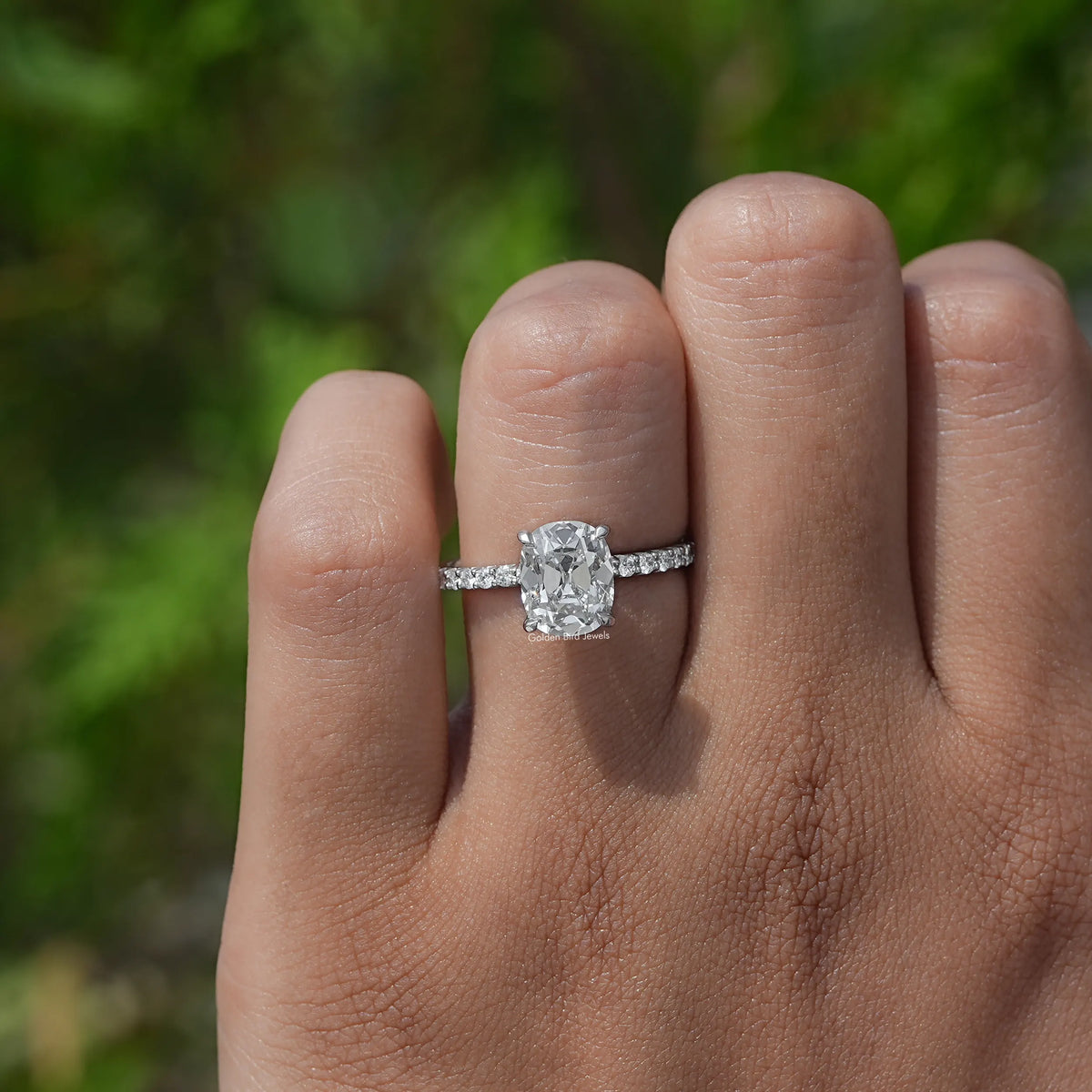 Back view of a Solitaire Accent Diamond Ring in prongs setting 