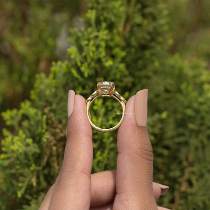 Gold-tone engagement ring, cushion-cut center stone with four round accent stones