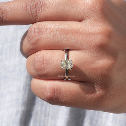 Cushion-cut moissanite solitaire ring with slim band and four-prong setting