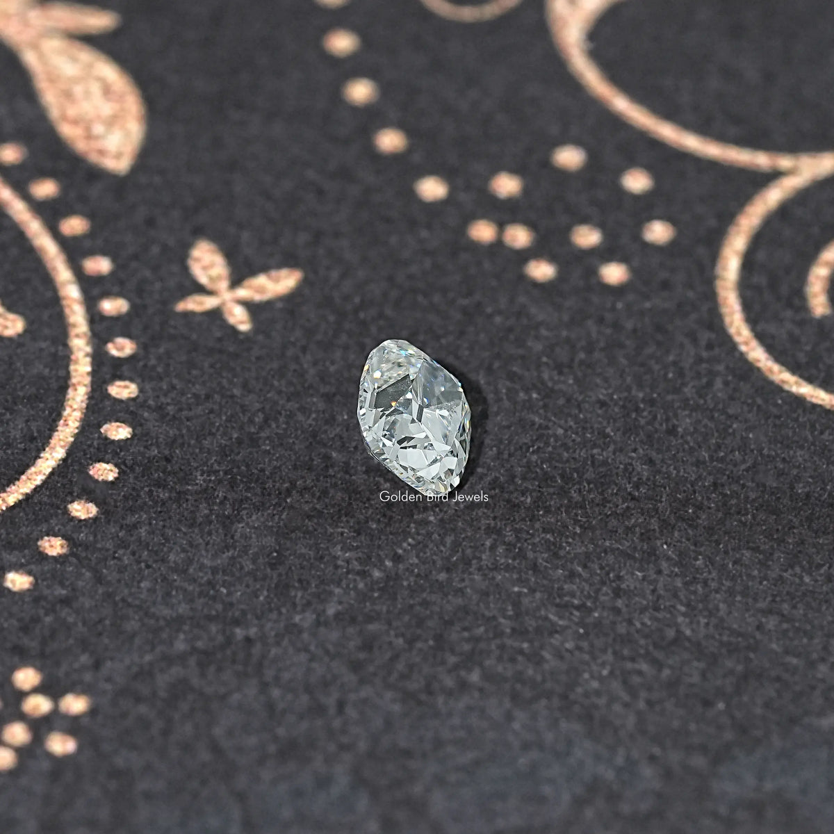 Old Mine cut lab-grown diamond, small cushion shape with faceted sparkle.