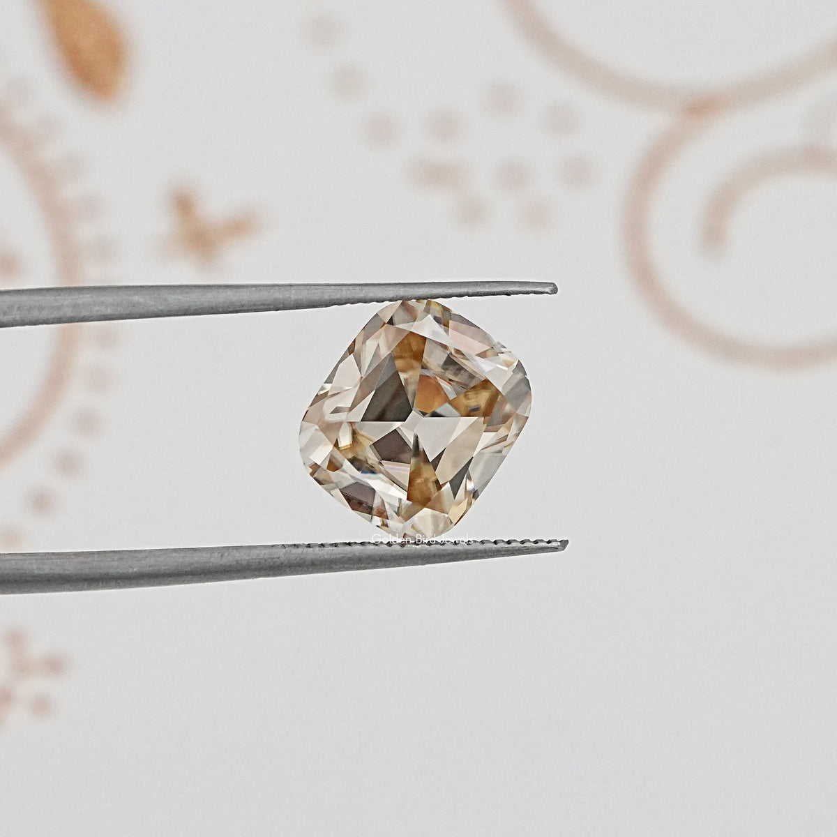 In Tweezer View Of Old Mine Cushion Cut Loose Moissanite Stone