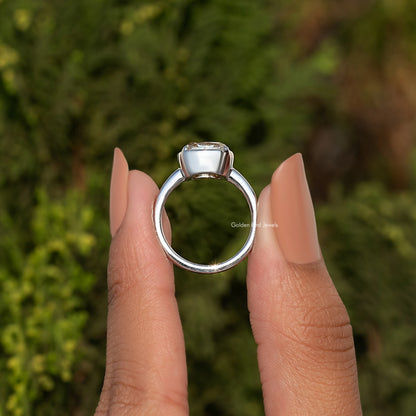 Sterling silver moissanite solitaire ring with open gallery under cushion center