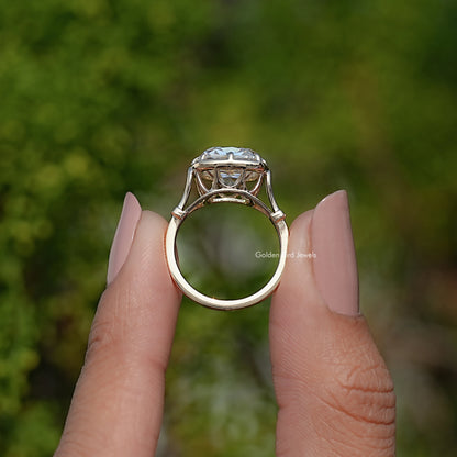 Gold cushion-cut moissanite solitaire ring, top view of prongs