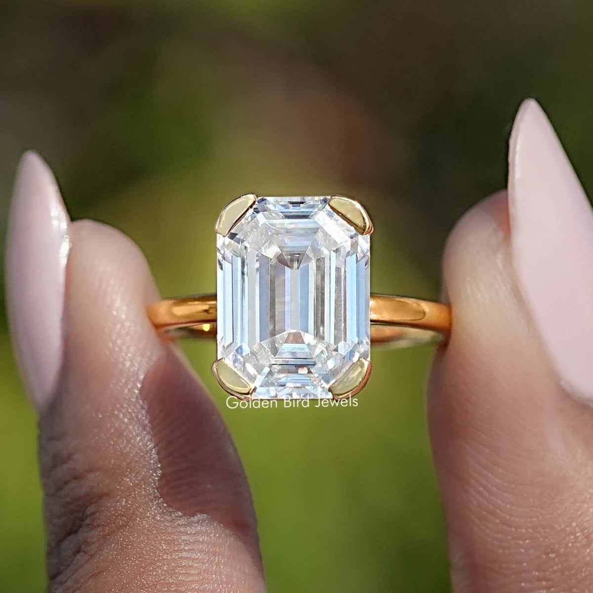 Front View of Off White Old Mine Moissanite Emerald Cut Ring