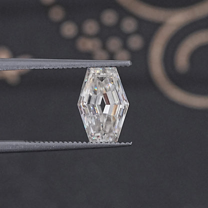 In Tweezer View Of Old Mine Lozenge Cut Loose Moissanite Stone