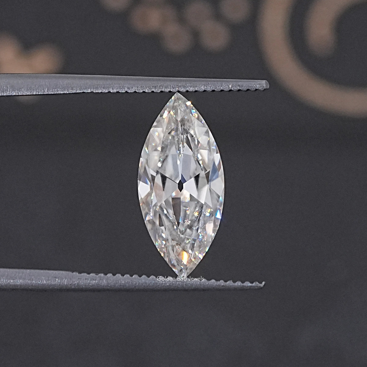 In Tweezer View Of Old Mine Marquise Cut Loose Moissanite Stone