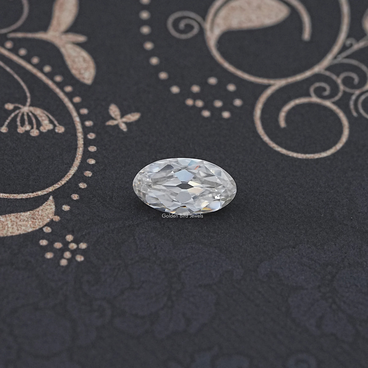 Oval moissanite loose stone, close-up with faceted sparkle and reflections