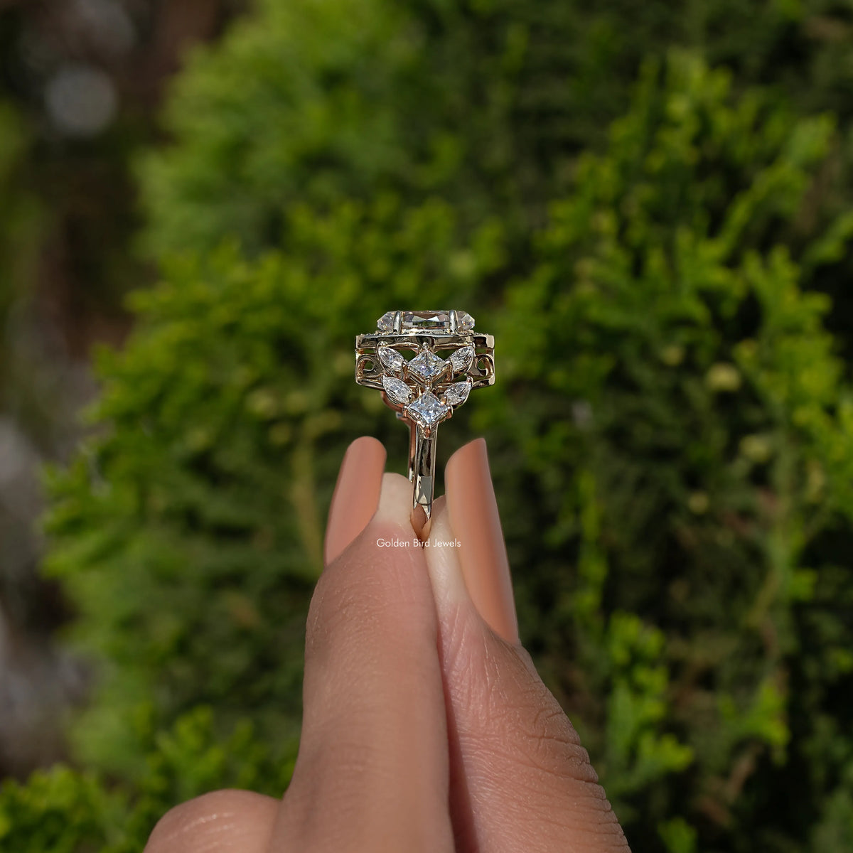 14K yellow gold halo engagement ring, prong-set oval center with marquise accents