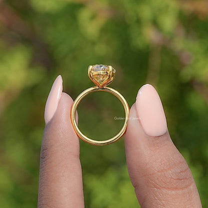 Gold-tone moissanite solitaire ring shank back view with open basket setting