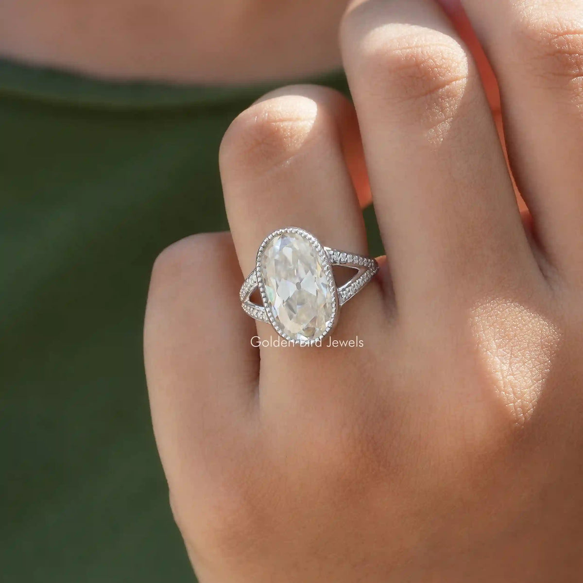 front view of oval cut engagement ring In Finger