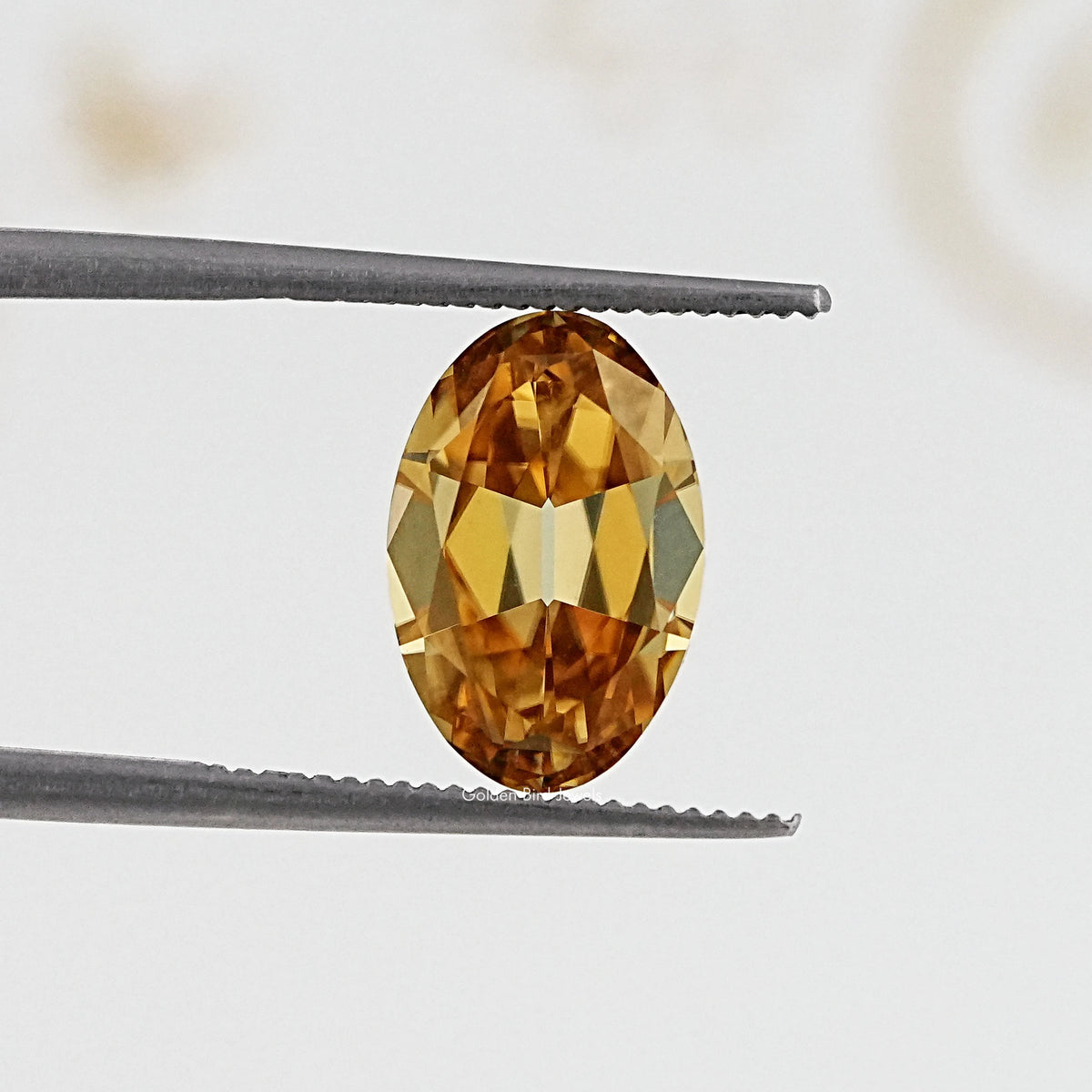 In Tweezer View Of Old Mine Oval Cut Loose Moissanite Stone