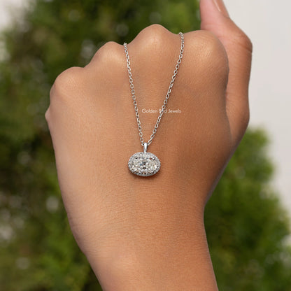 In hand Showing View Of Old Mine Oval Moissanite Pendant 