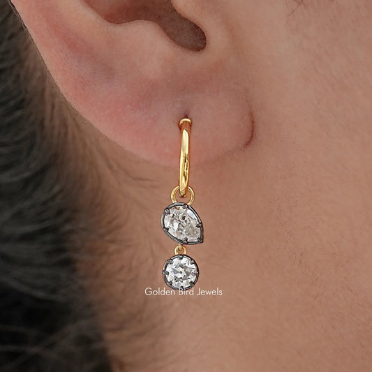 In Ear view of Old Mine Pear And Round Moissanite Dangle Hoop Earrings